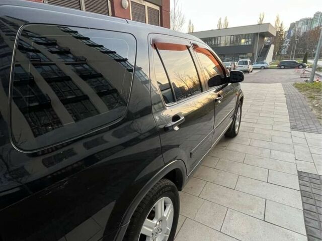 Черный Хонда СРВ, объемом двигателя 2.4 л и пробегом 260 тыс. км за 7000 $, фото 3 на Automoto.ua