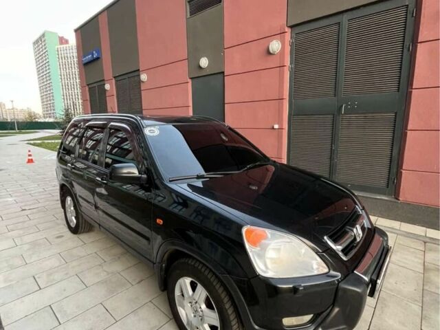 Черный Хонда СРВ, объемом двигателя 2.4 л и пробегом 260 тыс. км за 7000 $, фото 1 на Automoto.ua