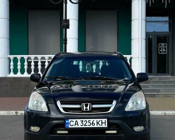 Черный Хонда СРВ, объемом двигателя 2 л и пробегом 250 тыс. км за 6800 $, фото 1 на Automoto.ua