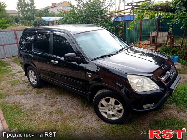 Чорний Хонда СРВ, об'ємом двигуна 2 л та пробігом 280 тис. км за 6850 $, фото 4 на Automoto.ua