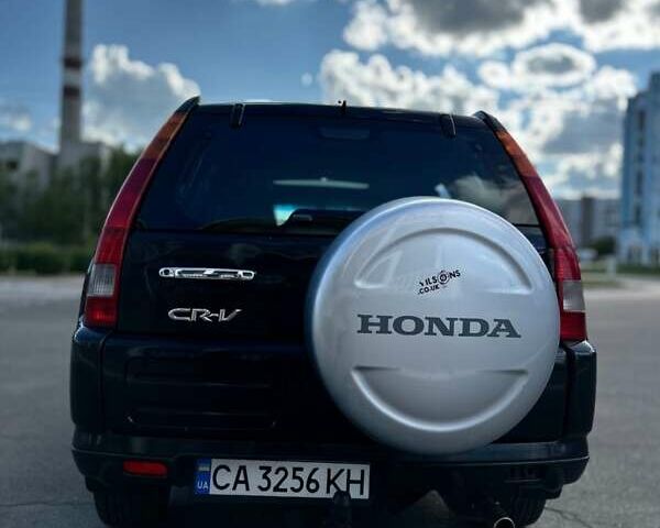 Черный Хонда СРВ, объемом двигателя 2 л и пробегом 250 тыс. км за 6800 $, фото 3 на Automoto.ua