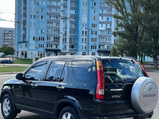 Чорний Хонда СРВ, об'ємом двигуна 2 л та пробігом 199 тис. км за 6500 $, фото 2 на Automoto.ua