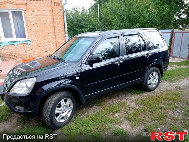 Чорний Хонда СРВ, об'ємом двигуна 2 л та пробігом 280 тис. км за 6850 $, фото 1 на Automoto.ua