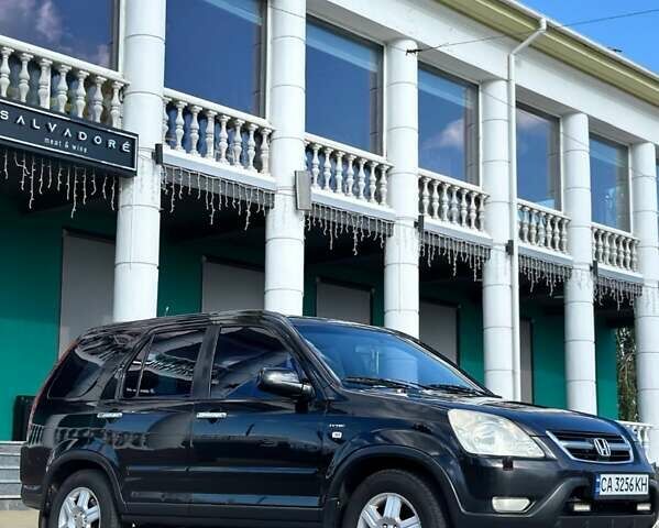 Черный Хонда СРВ, объемом двигателя 2 л и пробегом 250 тыс. км за 6800 $, фото 2 на Automoto.ua
