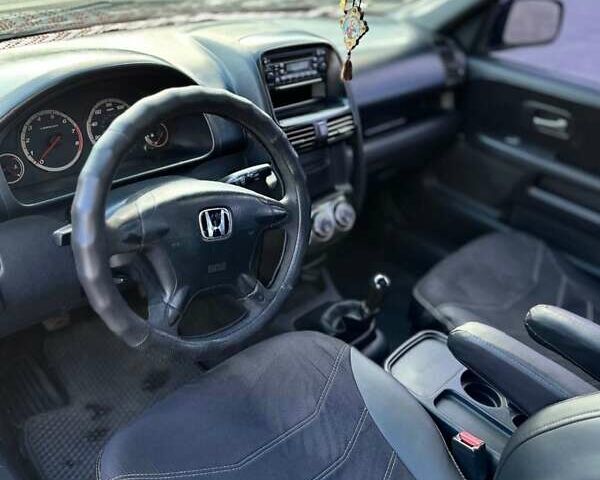 Черный Хонда СРВ, объемом двигателя 2 л и пробегом 250 тыс. км за 6800 $, фото 4 на Automoto.ua