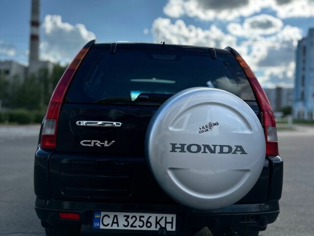 Чорний Хонда СРВ, об'ємом двигуна 2 л та пробігом 199 тис. км за 6500 $, фото 4 на Automoto.ua