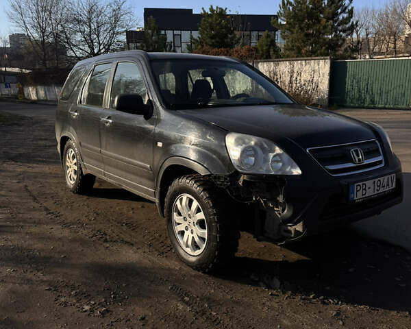 Черный Хонда СРВ, объемом двигателя 2.2 л и пробегом 251 тыс. км за 3000 $, фото 2 на Automoto.ua