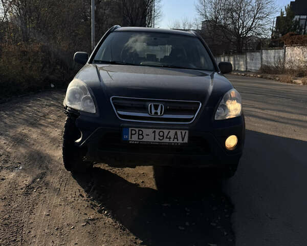 Черный Хонда СРВ, объемом двигателя 2.2 л и пробегом 251 тыс. км за 3000 $, фото 1 на Automoto.ua