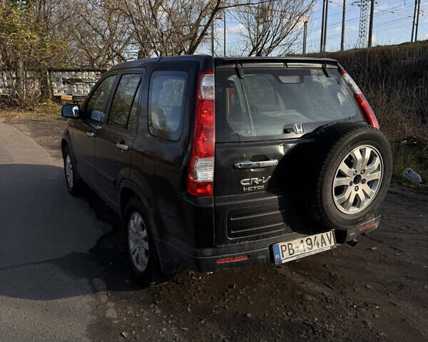 Черный Хонда СРВ, объемом двигателя 2.2 л и пробегом 251 тыс. км за 3000 $, фото 6 на Automoto.ua