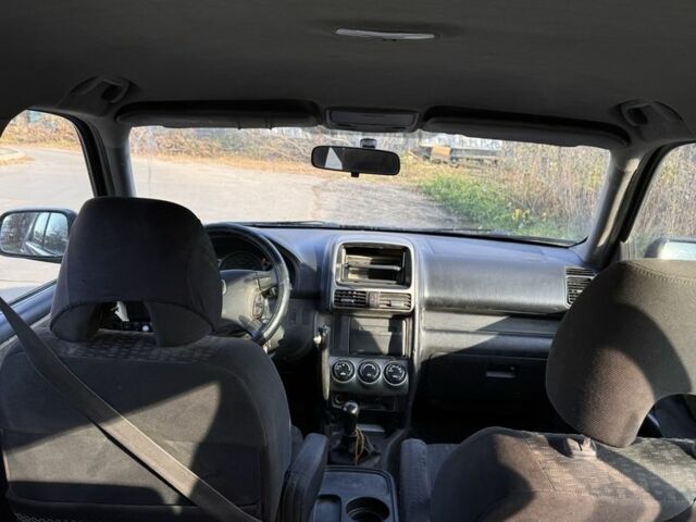 Черный Хонда СРВ, объемом двигателя 2.2 л и пробегом 251 тыс. км за 3000 $, фото 7 на Automoto.ua