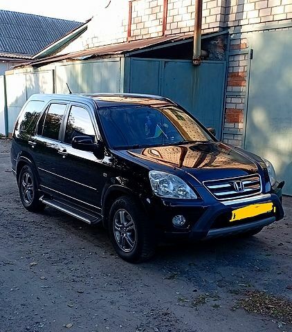 Черный Хонда СРВ, объемом двигателя 2.2 л и пробегом 317 тыс. км за 4300 $, фото 1 на Automoto.ua