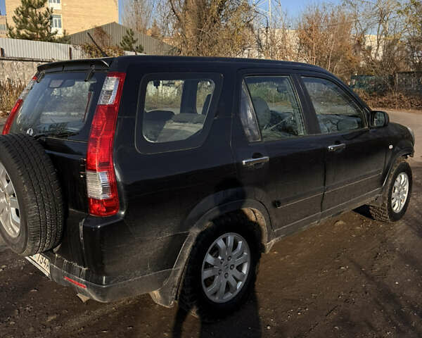 Черный Хонда СРВ, объемом двигателя 2.2 л и пробегом 251 тыс. км за 3000 $, фото 4 на Automoto.ua