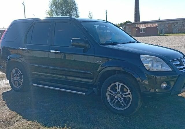 Чорний Хонда СРВ, об'ємом двигуна 2.2 л та пробігом 317 тис. км за 4500 $, фото 1 на Automoto.ua
