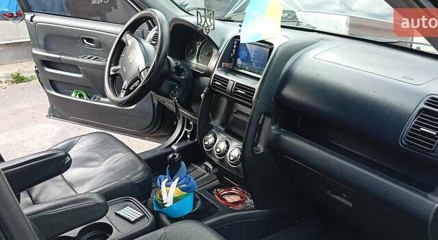 Чорний Хонда СРВ, об'ємом двигуна 2.2 л та пробігом 317 тис. км за 4500 $, фото 3 на Automoto.ua