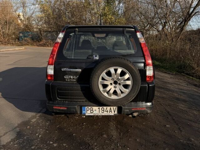 Черный Хонда СРВ, объемом двигателя 2.2 л и пробегом 251 тыс. км за 3000 $, фото 5 на Automoto.ua