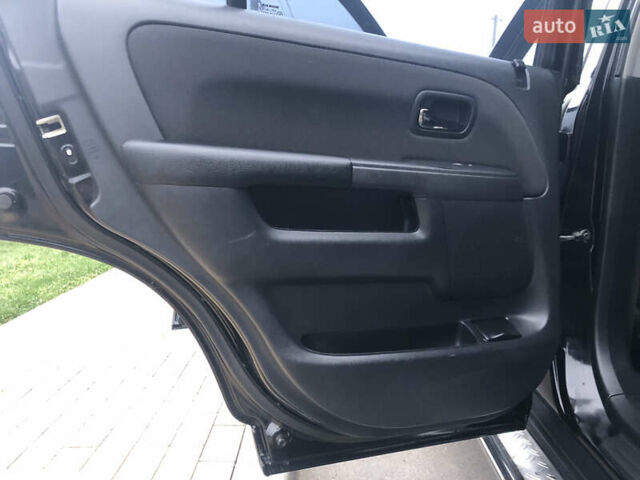 Чорний Хонда СРВ, об'ємом двигуна 2 л та пробігом 97 тис. км за 11200 $, фото 59 на Automoto.ua