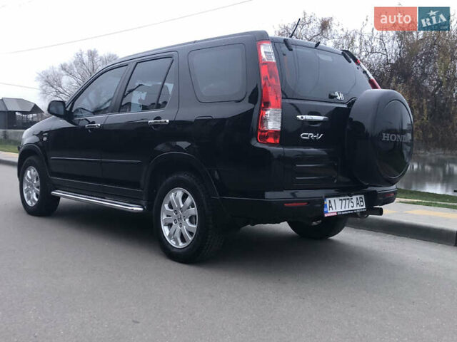 Чорний Хонда СРВ, об'ємом двигуна 2 л та пробігом 97 тис. км за 11200 $, фото 7 на Automoto.ua