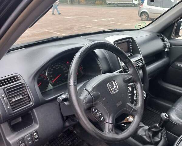 Хонда СРВ 2006 в Сумах на Automoto.ua Черный Хонда СРВ, объемом двигателя 2.2 л и пробегом 196 тыс. км за 10500 $, фото 4 на Automoto.ua