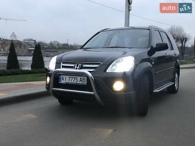 Чорний Хонда СРВ, об'ємом двигуна 2 л та пробігом 97 тис. км за 11200 $, фото 14 на Automoto.ua