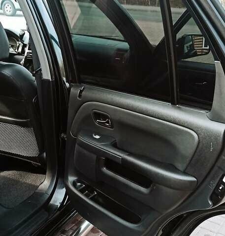 Черный Хонда СРВ, объемом двигателя 2 л и пробегом 186 тыс. км за 10000 $, фото 9 на Automoto.ua