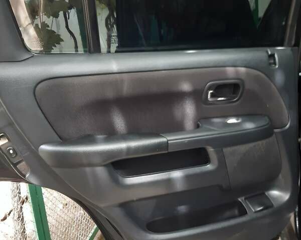 Черный Хонда СРВ, объемом двигателя 2 л и пробегом 316 тыс. км за 8200 $, фото 16 на Automoto.ua