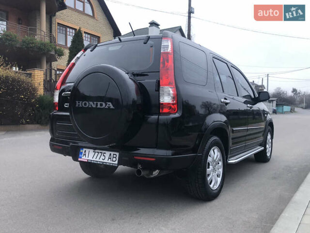 Чорний Хонда СРВ, об'ємом двигуна 2 л та пробігом 97 тис. км за 11200 $, фото 36 на Automoto.ua