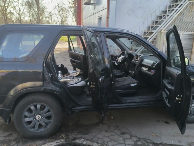 Чорний Хонда СРВ, об'ємом двигуна 2 л та пробігом 281 тис. км за 4500 $, фото 4 на Automoto.ua