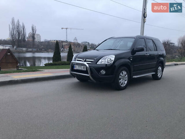 Чорний Хонда СРВ, об'ємом двигуна 2 л та пробігом 97 тис. км за 11200 $, фото 4 на Automoto.ua