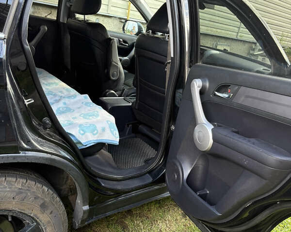 Черный Хонда СРВ, объемом двигателя 2.2 л и пробегом 247 тыс. км за 9600 $, фото 8 на Automoto.ua