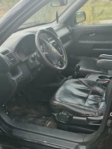 Чорний Хонда СРВ, об'ємом двигуна 2.2 л та пробігом 303 тис. км за 3600 $, фото 4 на Automoto.ua