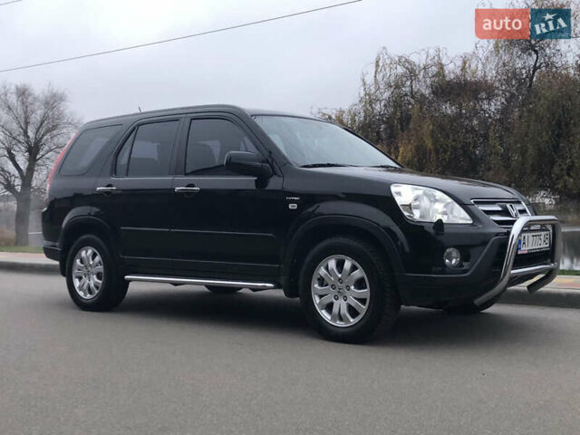 Чорний Хонда СРВ, об'ємом двигуна 2 л та пробігом 97 тис. км за 11200 $, фото 26 на Automoto.ua