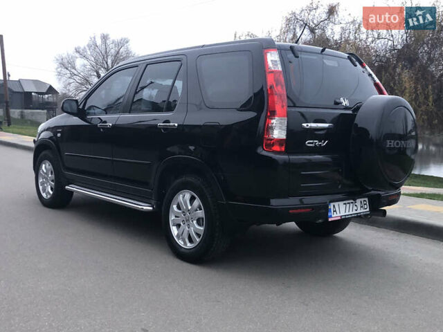 Чорний Хонда СРВ, об'ємом двигуна 2 л та пробігом 97 тис. км за 11200 $, фото 6 на Automoto.ua