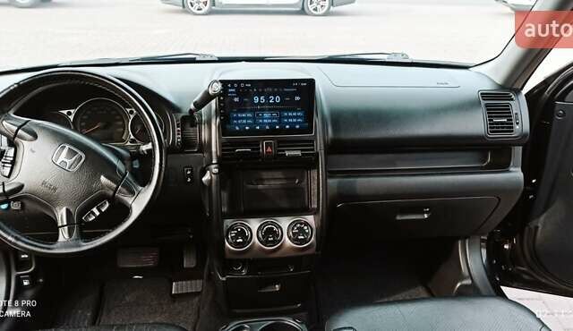 Черный Хонда СРВ, объемом двигателя 2 л и пробегом 186 тыс. км за 10000 $, фото 8 на Automoto.ua