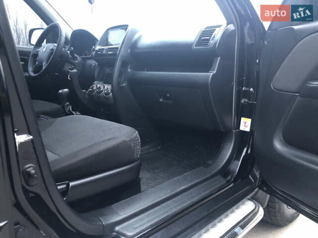 Чорний Хонда СРВ, об'ємом двигуна 2 л та пробігом 97 тис. км за 11200 $, фото 49 на Automoto.ua