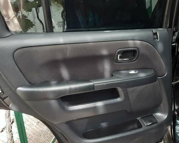 Черный Хонда СРВ, объемом двигателя 2 л и пробегом 316 тыс. км за 8200 $, фото 17 на Automoto.ua