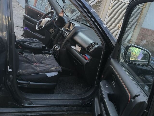 Чорний Хонда СРВ, об'ємом двигуна 2 л та пробігом 281 тис. км за 4500 $, фото 6 на Automoto.ua