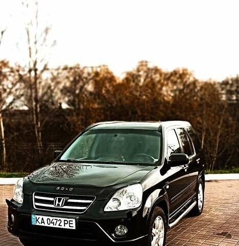 Черный Хонда СРВ, объемом двигателя 2 л и пробегом 186 тыс. км за 10000 $, фото 1 на Automoto.ua