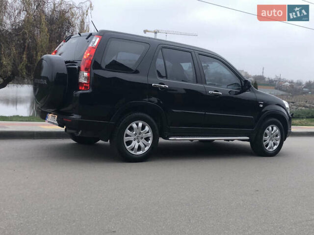 Чорний Хонда СРВ, об'ємом двигуна 2 л та пробігом 97 тис. км за 11200 $, фото 27 на Automoto.ua