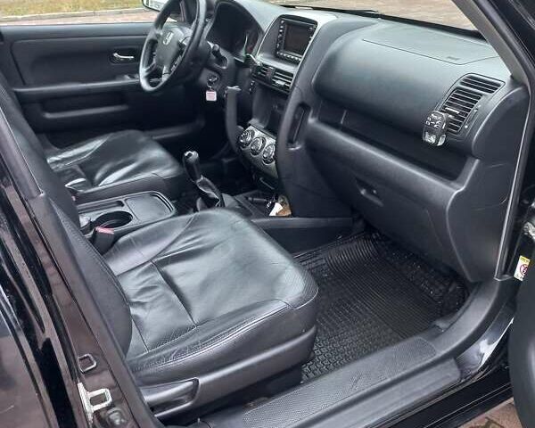 Хонда СРВ 2006 в Сумах на Automoto.ua Черный Хонда СРВ, объемом двигателя 2.2 л и пробегом 196 тыс. км за 10500 $, фото 7 на Automoto.ua