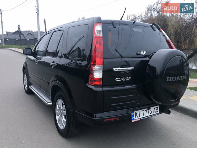 Чорний Хонда СРВ, об'ємом двигуна 2 л та пробігом 97 тис. км за 11200 $, фото 34 на Automoto.ua