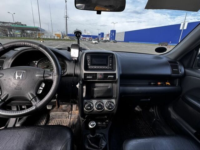 Черный Хонда СРВ, объемом двигателя 2 л и пробегом 290 тыс. км за 4700 $, фото 3 на Automoto.ua