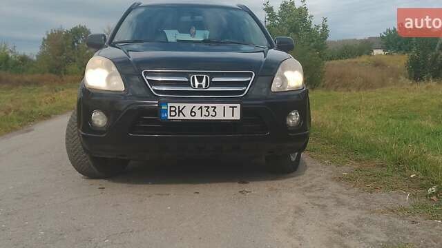 Чорний Хонда СРВ, об'ємом двигуна 2.2 л та пробігом 303 тис. км за 3600 $, фото 2 на Automoto.ua