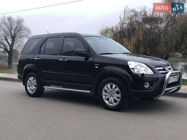 Чорний Хонда СРВ, об'ємом двигуна 2 л та пробігом 97 тис. км за 11200 $, фото 25 на Automoto.ua