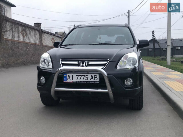 Чорний Хонда СРВ, об'ємом двигуна 2 л та пробігом 97 тис. км за 11200 $, фото 23 на Automoto.ua