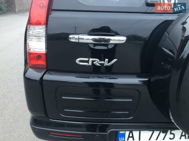 Чорний Хонда СРВ, об'ємом двигуна 2 л та пробігом 97 тис. км за 11200 $, фото 31 на Automoto.ua