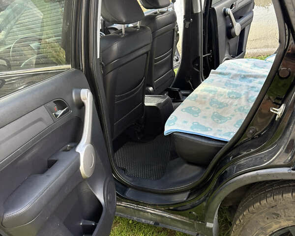 Черный Хонда СРВ, объемом двигателя 2.2 л и пробегом 247 тыс. км за 9600 $, фото 6 на Automoto.ua