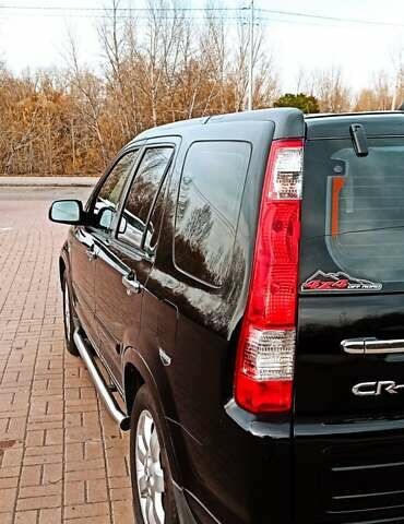 Черный Хонда СРВ, объемом двигателя 2 л и пробегом 186 тыс. км за 10000 $, фото 4 на Automoto.ua