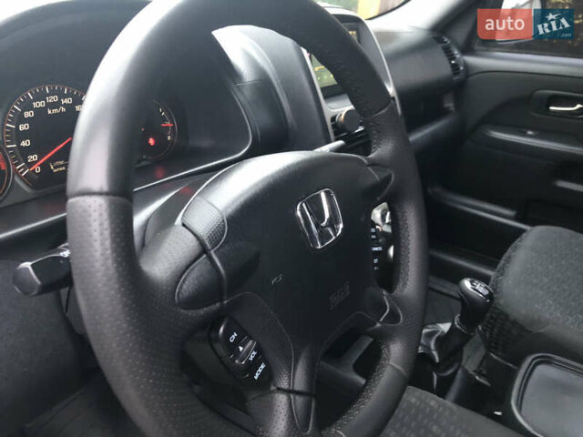 Чорний Хонда СРВ, об'ємом двигуна 2 л та пробігом 97 тис. км за 11200 $, фото 73 на Automoto.ua