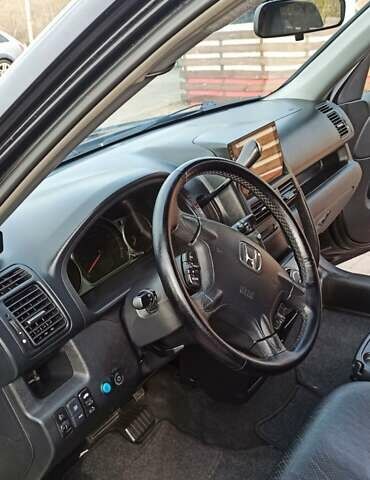 Черный Хонда СРВ, объемом двигателя 2 л и пробегом 186 тыс. км за 10000 $, фото 12 на Automoto.ua