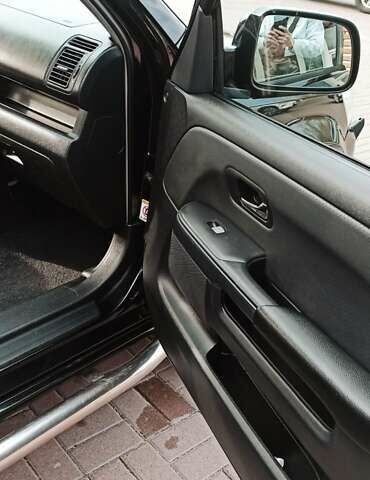 Черный Хонда СРВ, объемом двигателя 2 л и пробегом 186 тыс. км за 10000 $, фото 16 на Automoto.ua